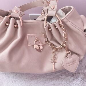 Juicy Couture rolling on satchel and mini barrel bag